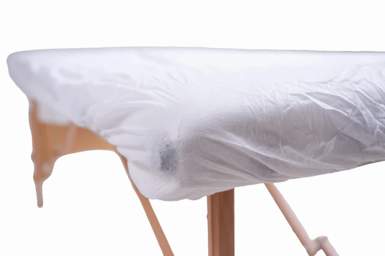 przescieradlo-skladane-gumka-100x220cm-10szt-qms-line-standard.jpg